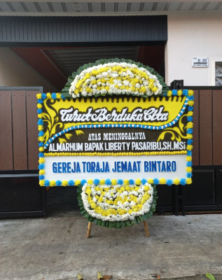 Papan Bunga Duka di Wanasaba